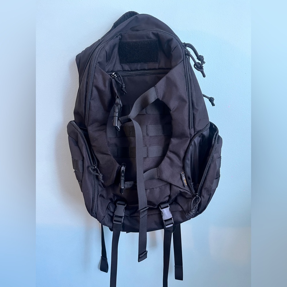 Sleek Black Tactical Backpack - image 1